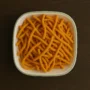 Freshly fried Minapappu Murukulu made from urad dal and rice flour.